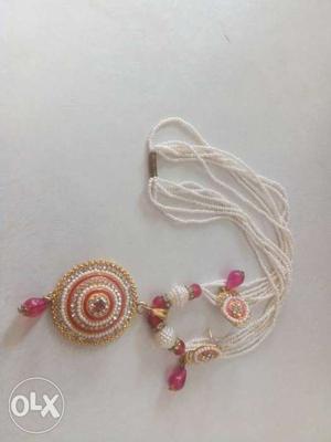 Pink and white pearl necklace