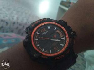 Round Black And Red Caso G-Shock Sports Watch