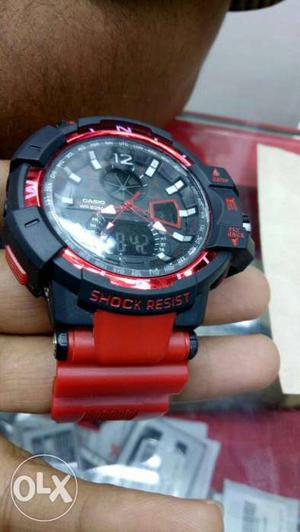 Round Black Digital Watch With Red Rubber Strap