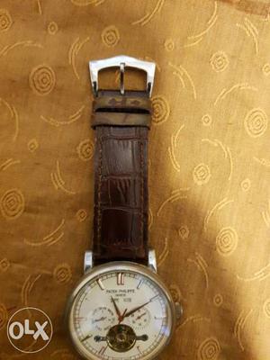 Round Faced Chronograph Watch With Brown Leather Strap