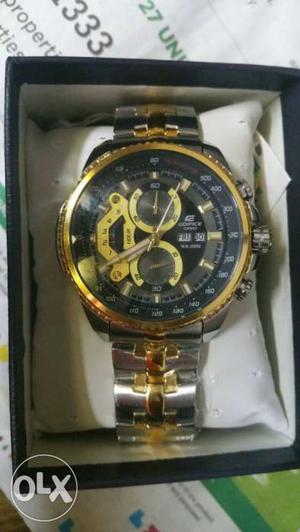 Round Gold Chronograph Watch With Silver And Gold Link