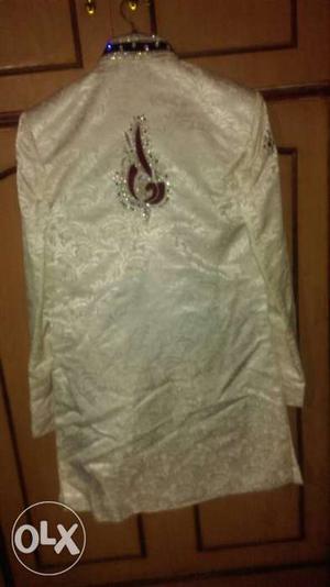 Sherwani almost like new condition with red color dhoti look
