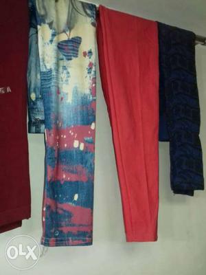 Three Blue, Red, And Black Skinny Pants