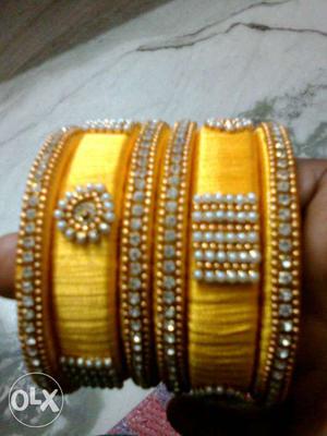Two Gemstone Embellished Yellow Silk Thread Bangles