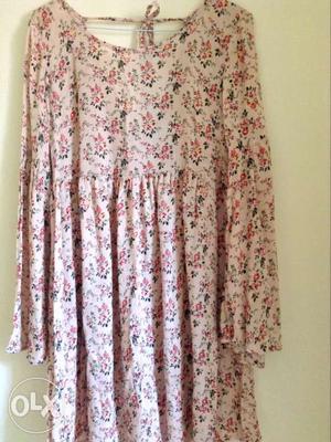Unused new floral dress to look beautiful, size