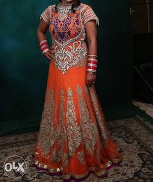 Very beautiful orange gown worn only once in neat