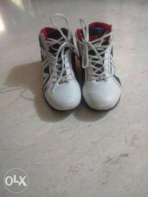 White-and-black high neck FILA Shoes Size 6
