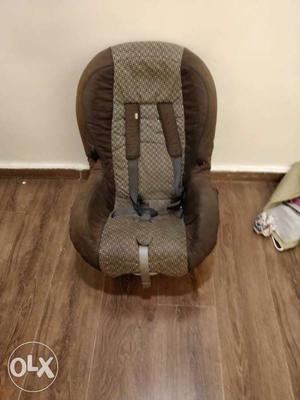 Baby's Gray And Brown Car Seat