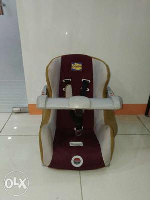 Baby's White And Beige Car Seat Carrier