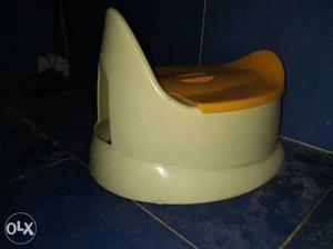 Beige And Brown Potty Trainer