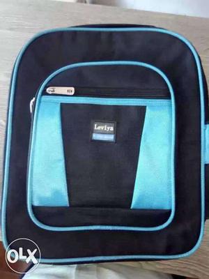 Black And Cyan School bag