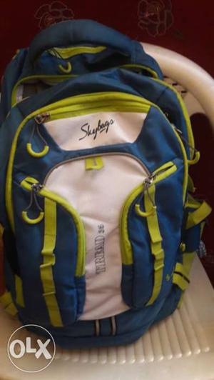 Blue, Green, And White Skybags Backpack only call 7o922o22o7
