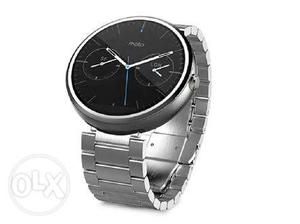 Moto 360 smart watch at best buy along with box and