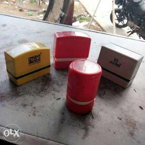 Pink, Yellow And White Plastic Containers
