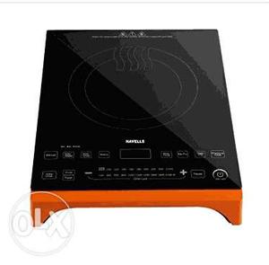 Black And Red Navelle Induction Stove