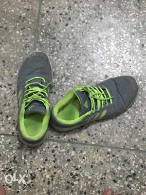 Pair Of Gray And Green Adidas Low Shoes