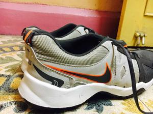 Pair Of White-gray-and-orange Nike Running Shoes