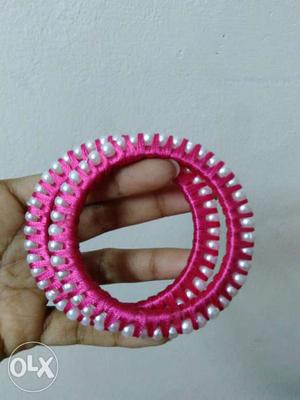 Pair of pink colour thread bangles