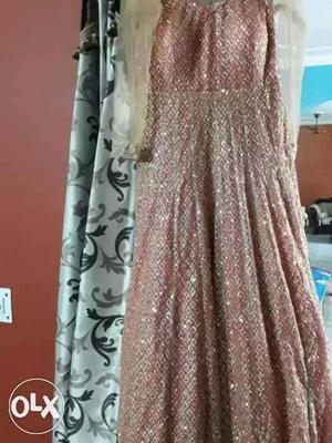 Pretty golden gown almost new need to sell,in