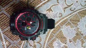 Round Black And Red Ferrari Chronograph Watch With Black