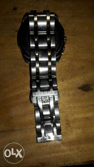 Round Silver Tissot Watch With Silver Link Bracelet