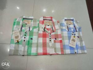 Three Green, Red, And Blue Dress Shirts
