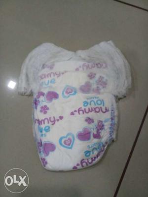White And Purple Disposable Diaper