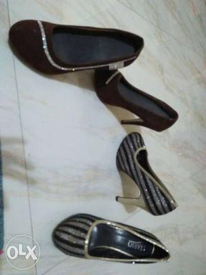 Women's Pair Of Black And Brown Pumps