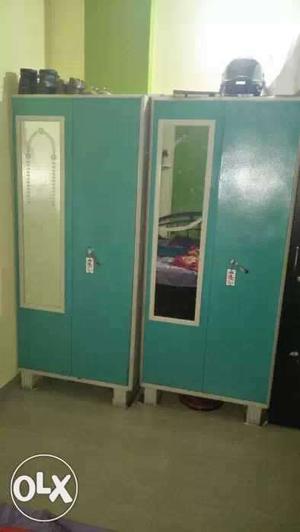 2 metal and 1 wooden wardrobes