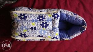 Baby's White, Black, And Blue Floral Carrycot