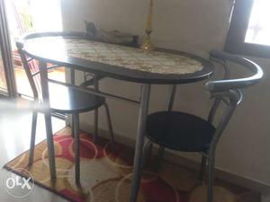 Compact dining table for two people. Takes very