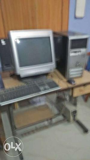 Compaq original with computer table and mouse