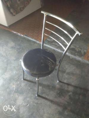 Silver And Black Padded Chair