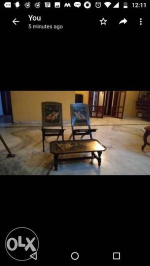 Two chairs and table with inlay work