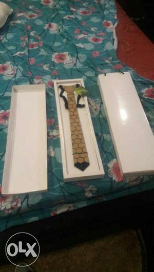 Unused wodden tie with price tag