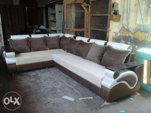 White Fabric Sectional Couch With Throw Pillows