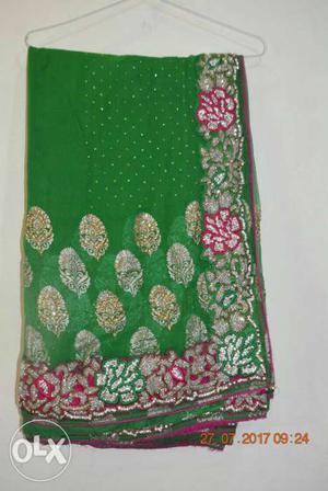Green And Pink Floral Textile