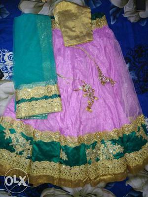 Green, Purple, And Yellow Traditional Dress