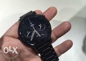 Moto 360 watch with original wireless charger