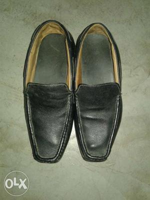Pair Of Black Leather Boat Shoes
