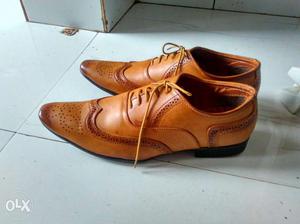 Pair Of Brown Leather Pointed Dress Shoes