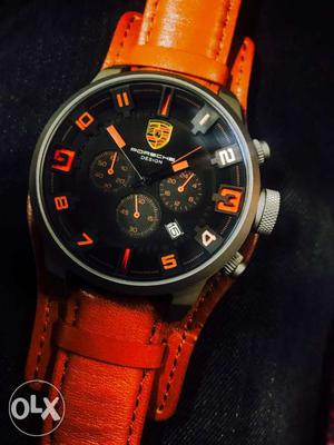 Round Silver Porsche Chronograph Watch With Orange Leather