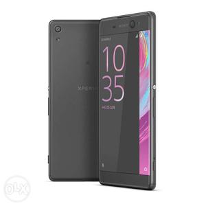 Sony Xperia XA Ultra and earphones charger and