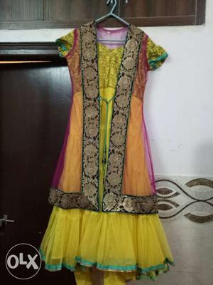 Yellow color anarkali frock with pink coti, pink