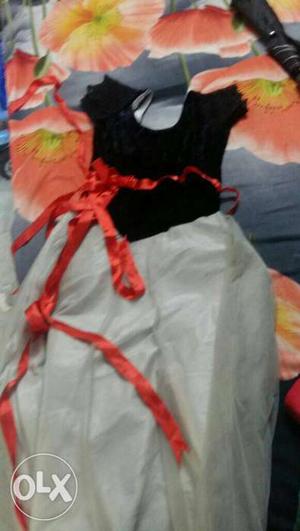 2 tym used !!!black and white gown with red