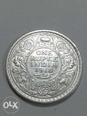 99 years old Indian one rupee coin of Silver.
