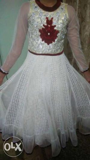 Beautiful white colour printed gown for seven
