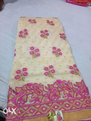 Beige And Pink Floral Textile