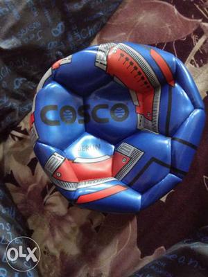 Blue, Red, And White Cosco Inflatable Ball