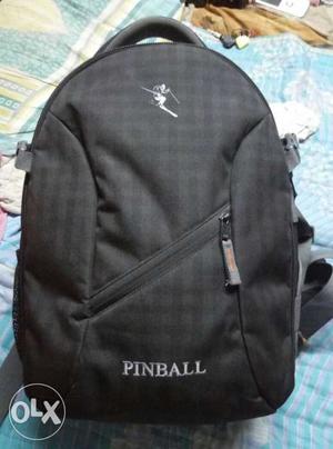 Gray And White Pinball camera Backpack
